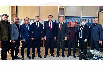 MHP’den Bakkallara Tebrik Ziyareti