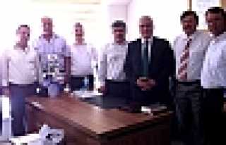 İLÇEMİZDEN GİDEN MÜDÜRLERE ZİYARET