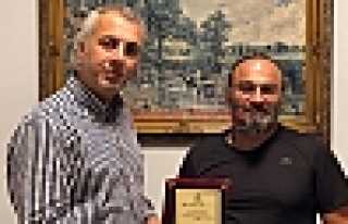 MHP İlçe Başkanı Babaoğlu Baycan’ı Kutladı