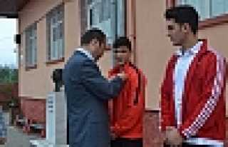 ŞAMPİYONLARA  ALTIN